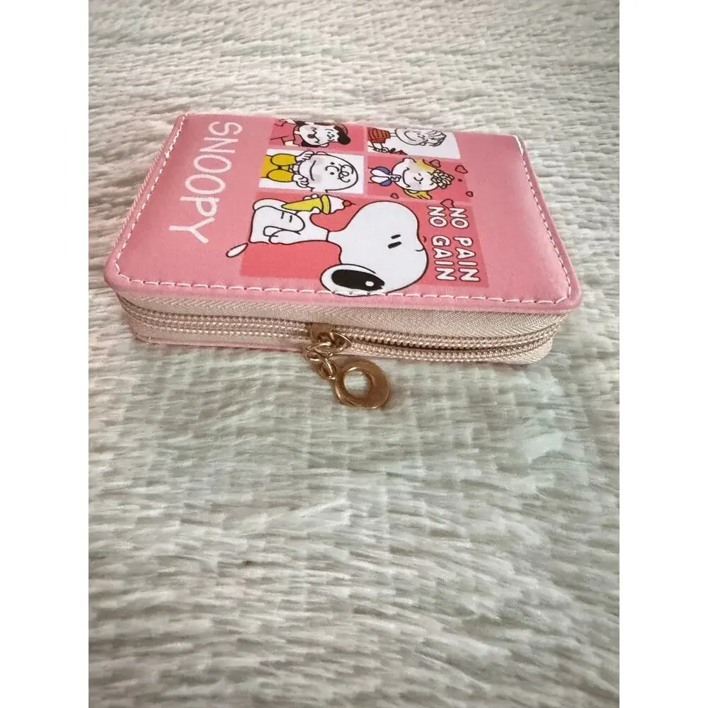 Pink Snoopy wallet with cartoon characters and 'NO PAIN NO GAIN' text
